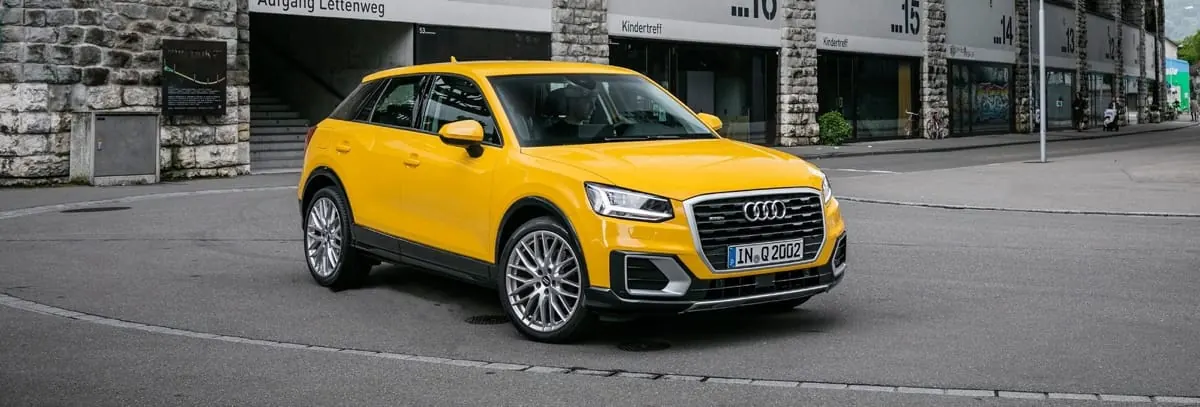 A yellow Audi Q2 on a Budapest street — the car of the VR film
