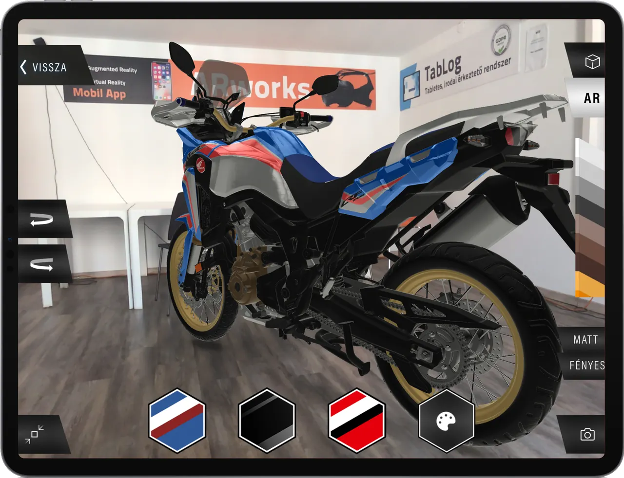 A Honda motorcycle in AR on an iPad screen, colour swatches below for part-by-part colouring