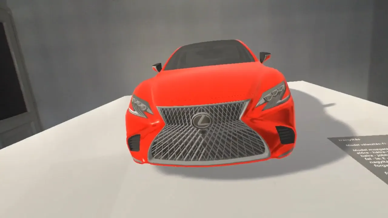 The 3D model of the red Lexus LS from the front, on a table, from the AR glasses’ point of view